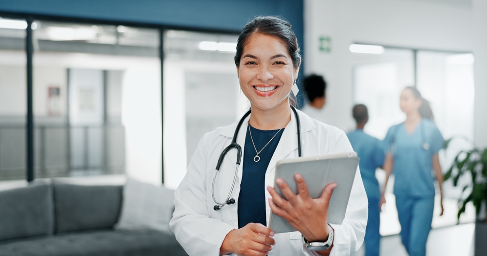 medical-specialist-presenting-coronavirus-using-tablet-sitting-desk-medical-office